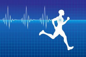 Athlete running with a heartbeat monitor